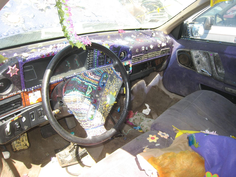 Illustration for article titled Groovalicious Purple Princess Of Peace Art Car Falls On Hard Times, Faces Crusher